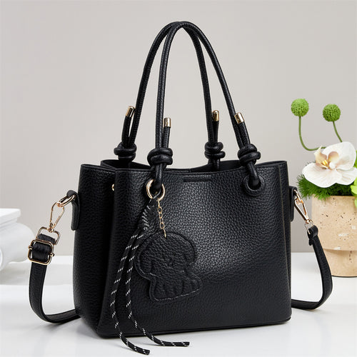 Damen Handtasche mit eleganten Details und abnehmbarer Quastenanhänger Nord Taschen