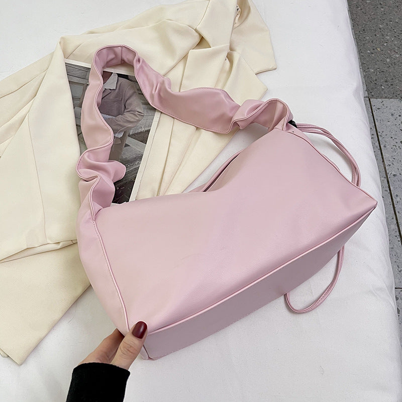 Damenhandtasche mit strukturiertem Polsterdesign und elegantem Tragegriff Nord Taschen