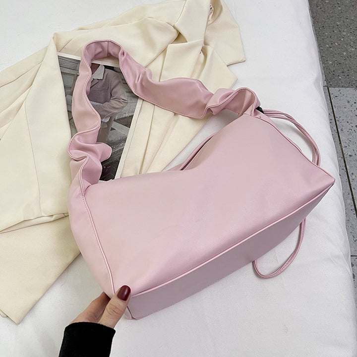 Damenhandtasche mit strukturiertem Polsterdesign und elegantem Tragegriff Nord Taschen