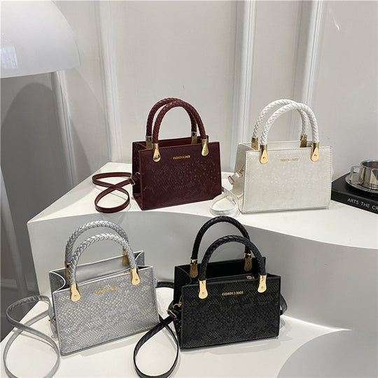 Damen Designer Handtasche mit strukturiertem Obermaterial und goldenen Akzenten Nord Taschen