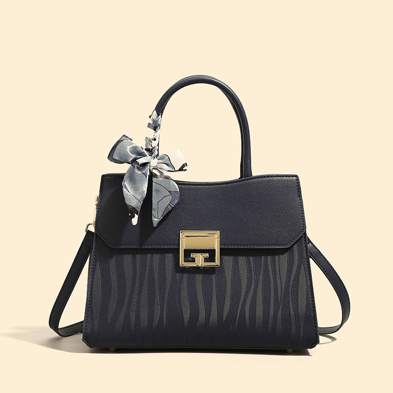 Damen Handtasche mit verstellbarem Schulterriemen und elegantem Schleifenakzent Nord Taschen