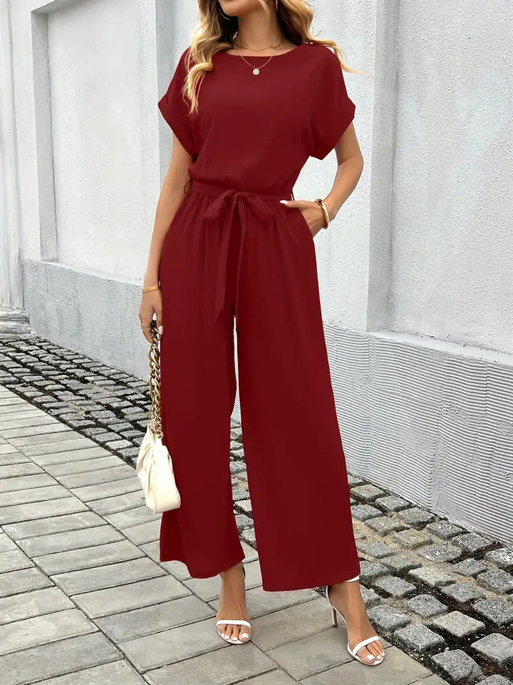 Damen Eleganter Jumpsuit mit weitem Bein und Taillenknoten Nord Taschen