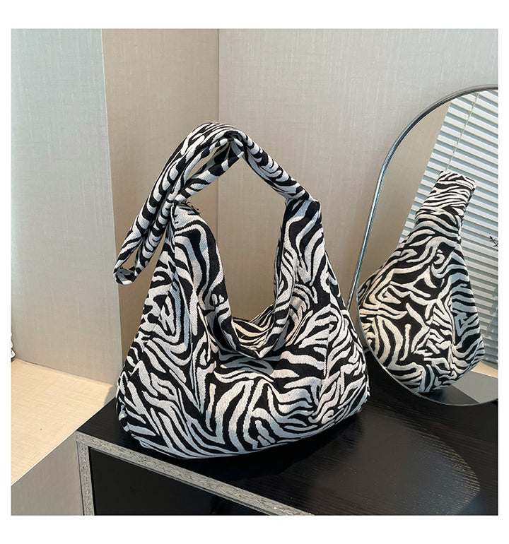 Damen trendy Beuteltasche im Zebra-Design Nord Taschen