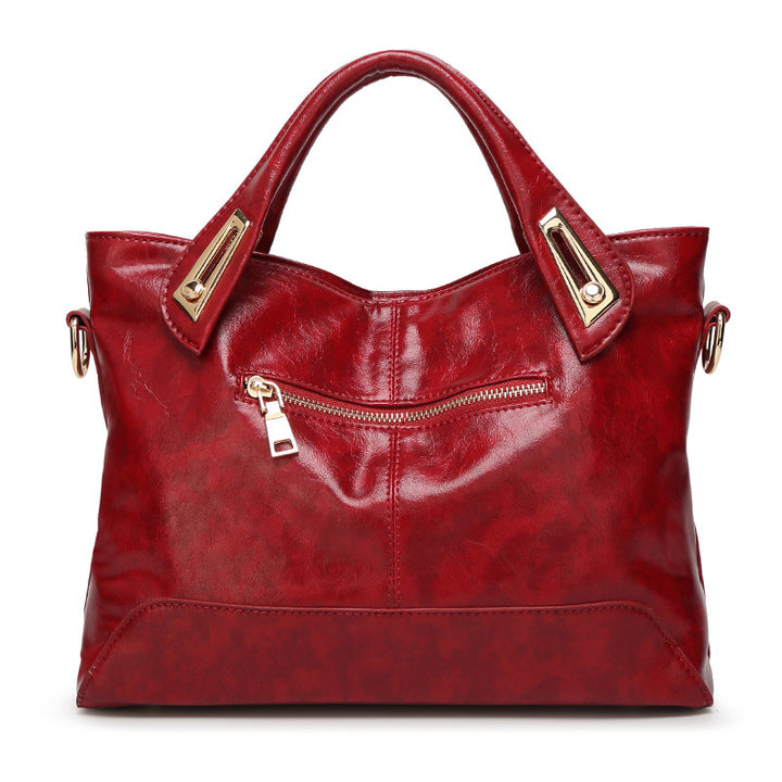 Damen Hobo-Tasche aus glänzendem Kunstleder mit eleganten Metallakzenten Nord Taschen