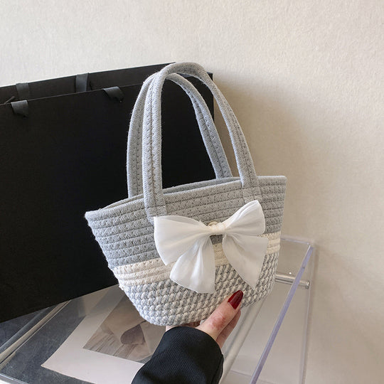 Damen Handtasche aus geflochtenem Naturmaterial mit floralem Detail Nord Taschen