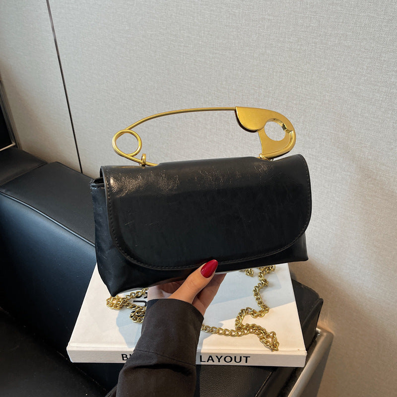 Damen elegante Handtasche mit künstlerischem Metallgriff Nord Taschen