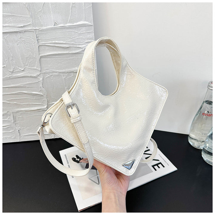 Damen stilvolle Handtasche aus glänzendem Kunstleder Nord Taschen