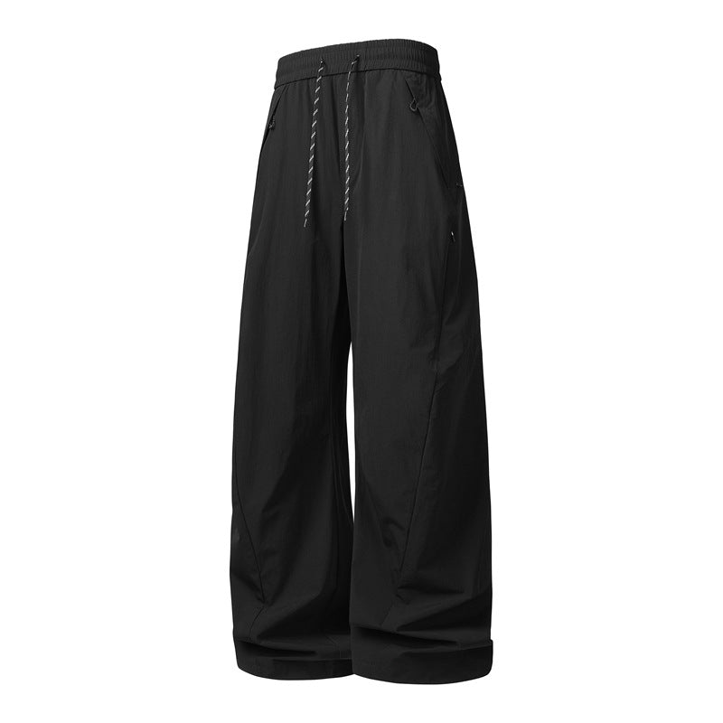 Unisex Weite Tech-Baggy-Hose mit elastischem Kordbund, Reißverschlusstaschen & wasserabweisender Nylonoptik Nord Taschen