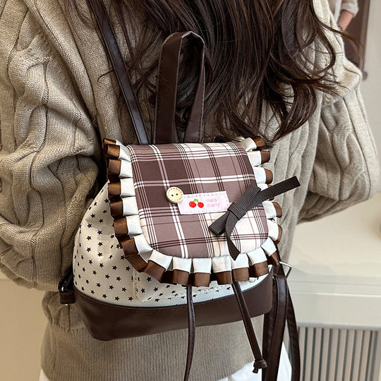 Damen Rucksack mit kreativem Karomuster und verspielten Details Nord Taschen