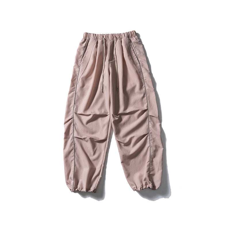 [Herren] weit geschnittene Nylon-Joggerhose im Utility-Stil mit Tunnelzugbund, Kontrastpaspel und elastischen Knöchelabschlüssen Nord Taschen