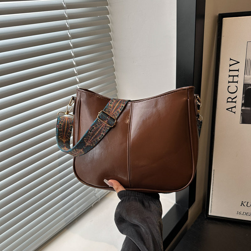 Damen elegante Umhängetasche mit kunstvollem Tragegurt Nord Taschen
