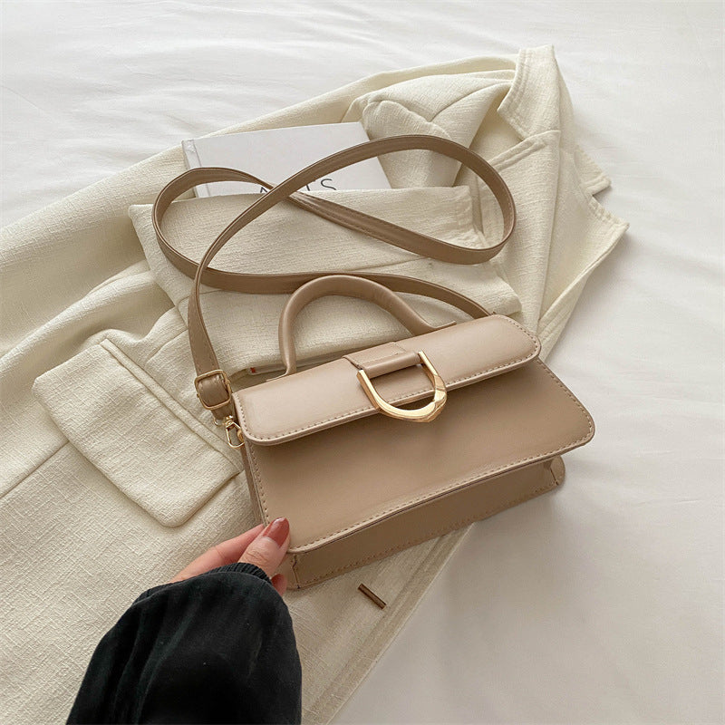 Damen elegante Umhängetasche mit strukturierter Oberfläche und goldenen Akzenten Nord Taschen
