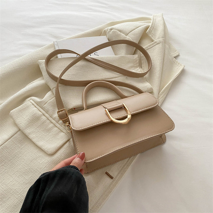 Damen elegante Umhängetasche mit strukturierter Oberfläche und goldenen Akzenten Nord Taschen
