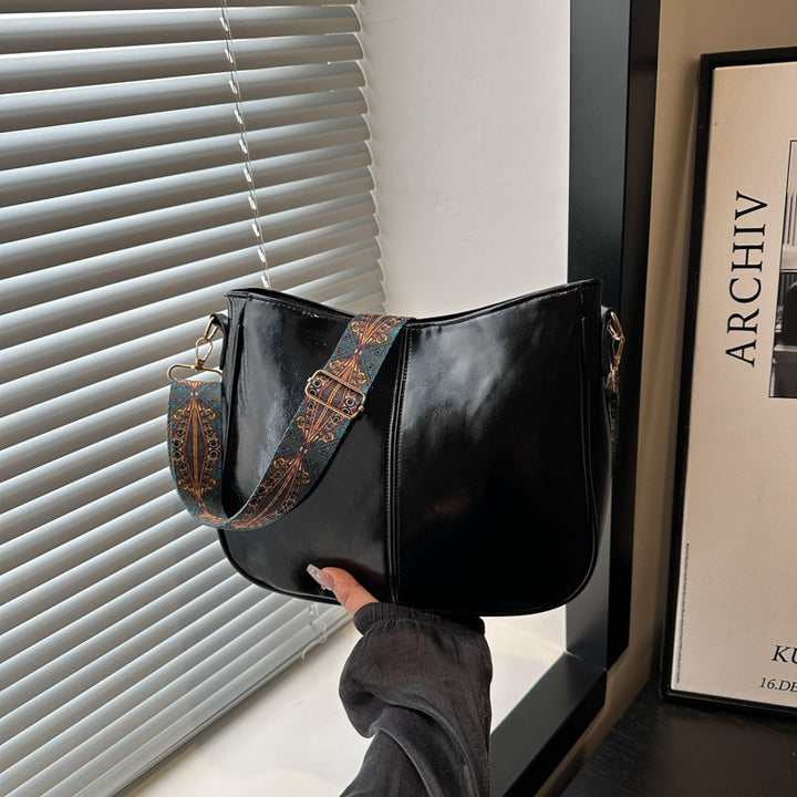 Damen elegante Umhängetasche mit kunstvollem Tragegurt Nord Taschen