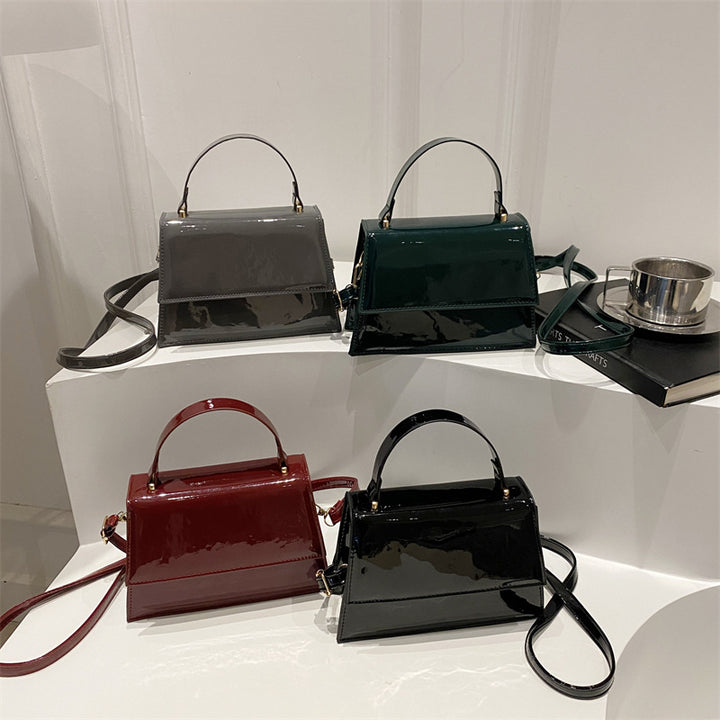 Damen stilvolle Lackleder Handtasche mit elegantem Klappverschluss Nord Taschen