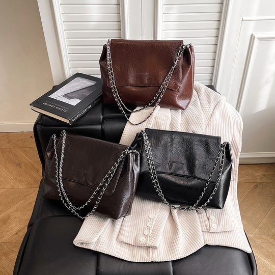 Damen modische Umhängetasche mit eleganter Kettenverzierung Nord Taschen