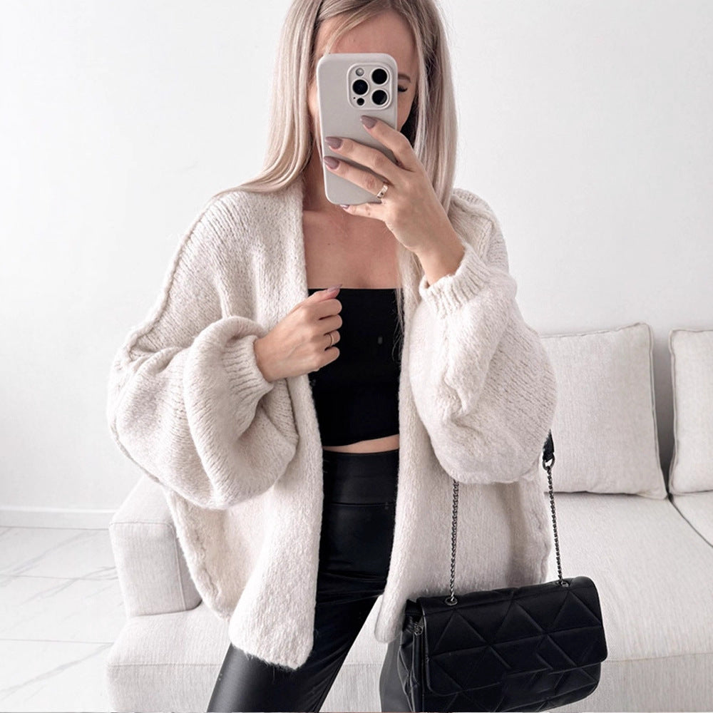 Damen Oversize Strickcardigan mit voluminösen Ballonärmeln und teddyähnlicher Struktur Nord Taschen