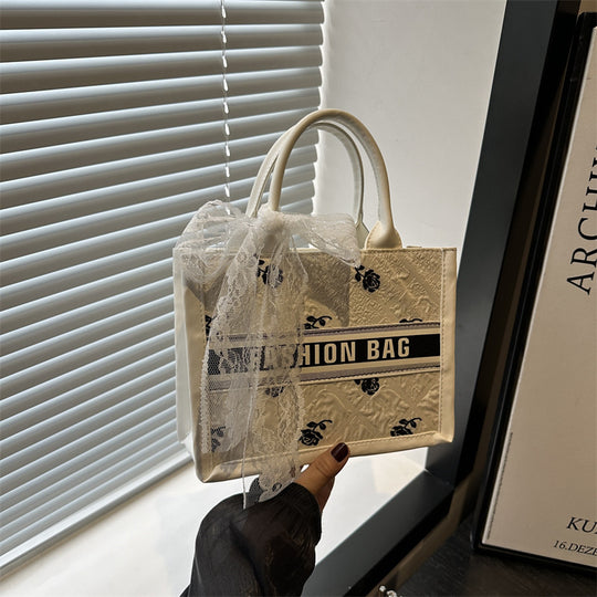 Damen modische Umhängetasche mit floralem Relief und verspieltem Schleifendetail Nord Taschen