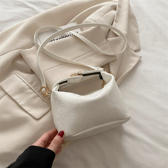 Damen Umhängetasche mit eleganter Schlangenprägung und praktischem Schulterriemen Nord Taschen