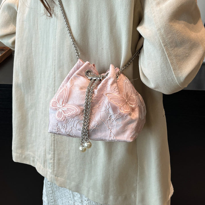 Damen Beuteltasche mit verspieltem Schmetterlingsdesign und eleganten Kettenakzenten Nord Taschen