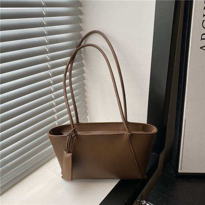 Damenhandtasche mit minimalistischer Silhouette und eleganten Details Nord Taschen