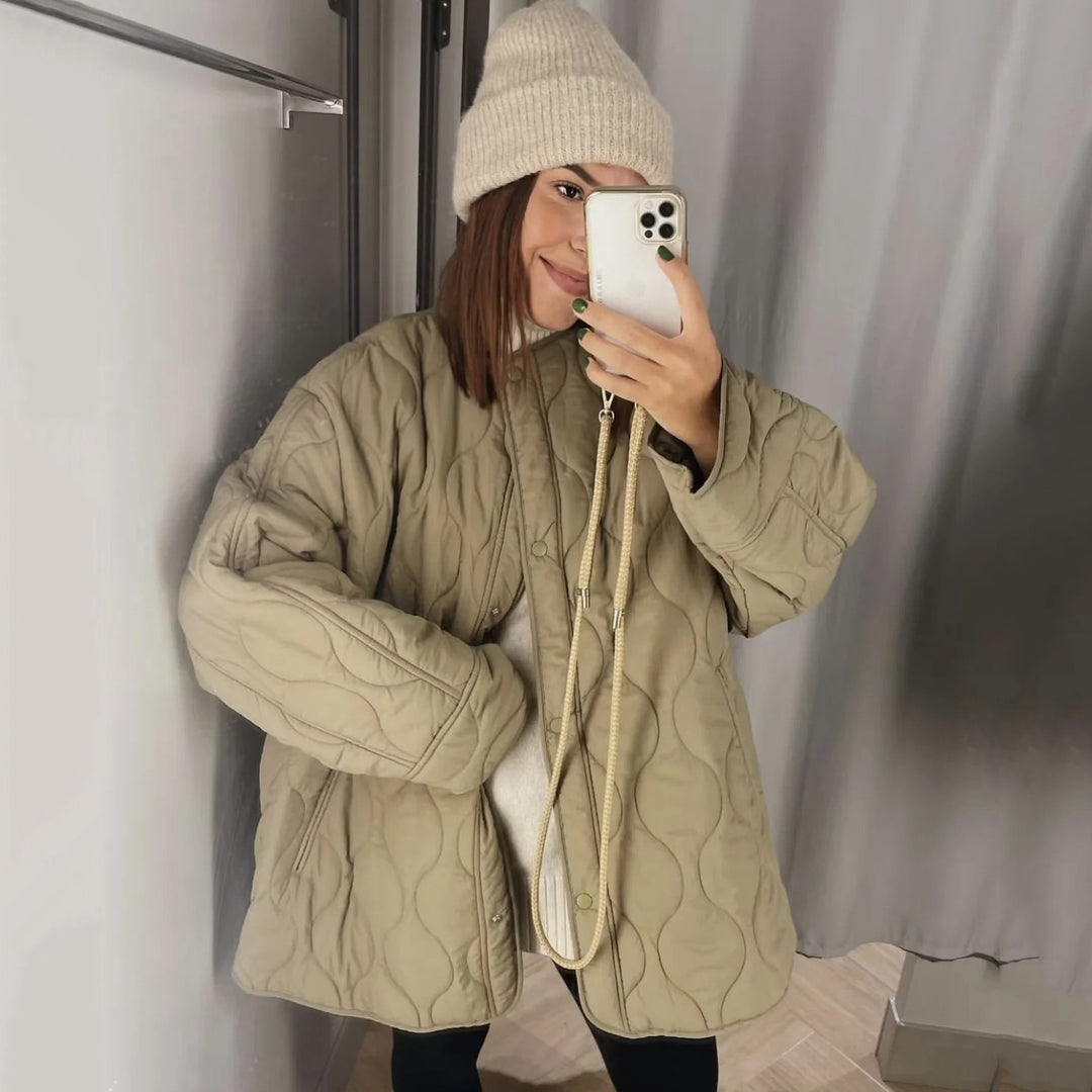Damen Steppjacke Longline mit Oversize‑Silhouette und Druckknopfverschluss Nord Taschen