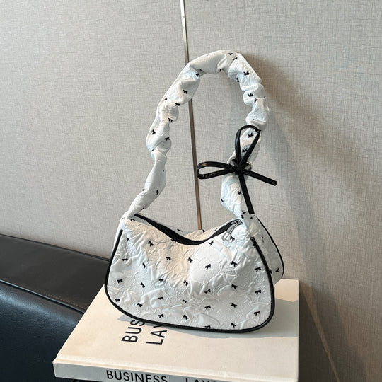 Damen Umhängetasche mit innovativer Schulterriemenstruktur und floralem Design Nord Taschen