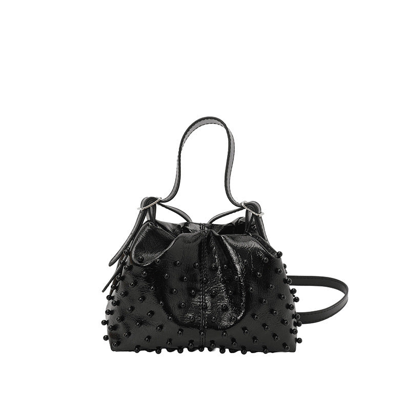 Damen Schultertasche mit strukturiertem Design und dekorativen Perlen Nord Taschen