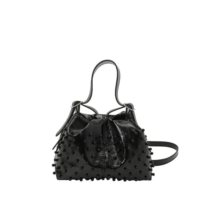 Damen Schultertasche mit strukturiertem Design und dekorativen Perlen Nord Taschen