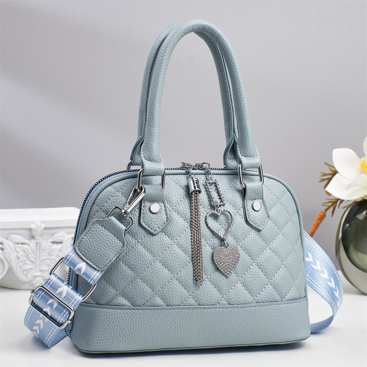 Damen elegante Handtasche mit elegantem Karomuster und modischen Anhängern Nord Taschen
