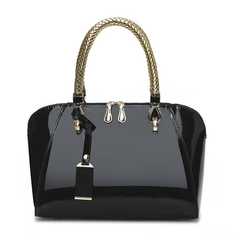 Damen Handtasche mit glänzender Oberfläche und eleganten Geflochtenen Griffen Nord Taschen
