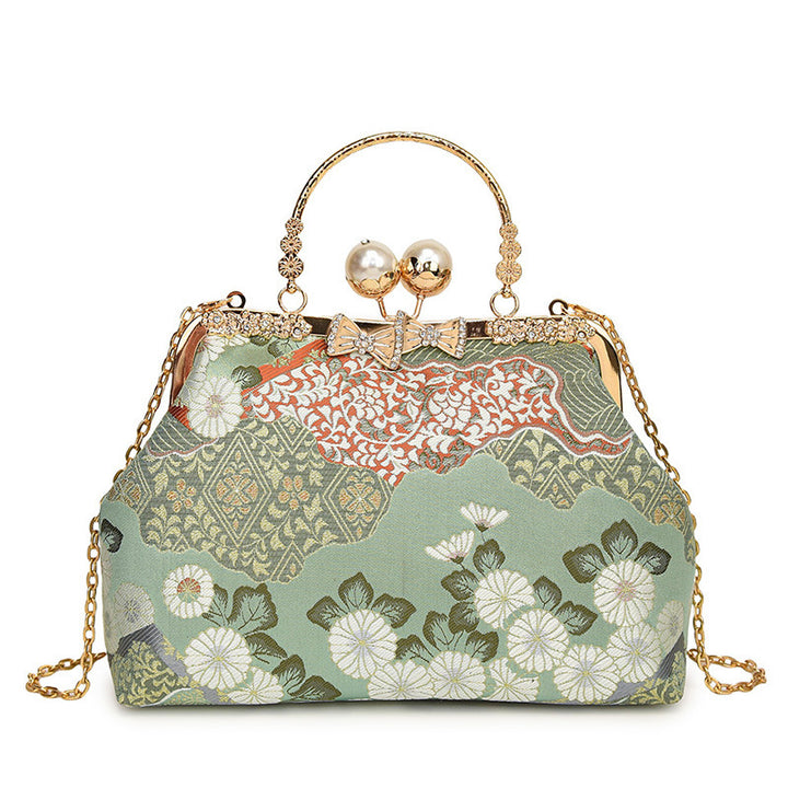 Damen elegante Umhängetasche mit floralem Design und Kunstlederakzenten Nord Taschen