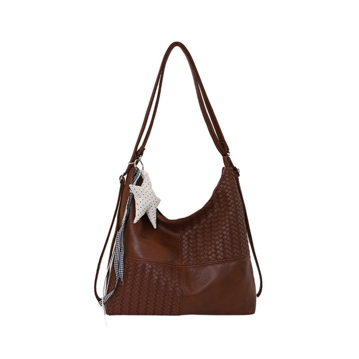 Damen Beuteltasche aus kunstvoll geflochtenem Leder mit elegantem Design Nord Taschen