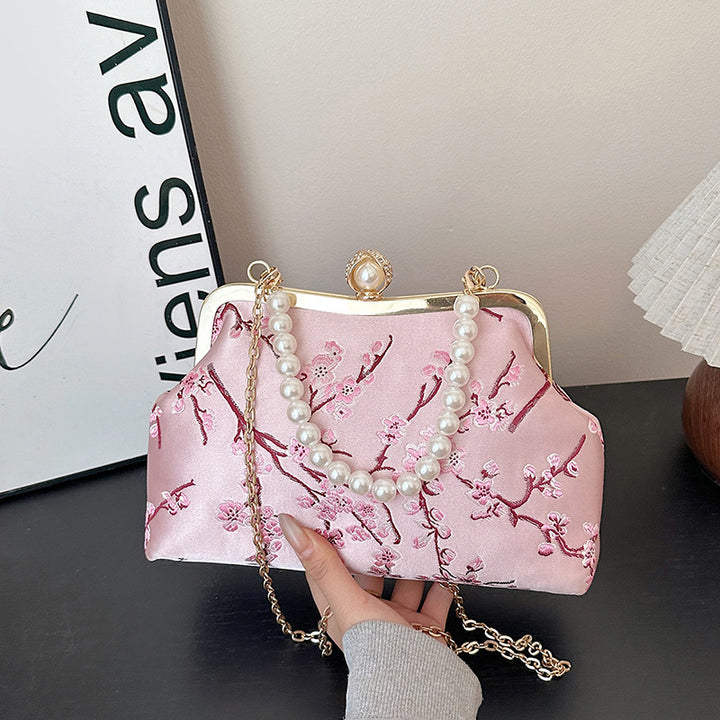 Damen elegante Clutch mit floralen Akzenten Nord Taschen