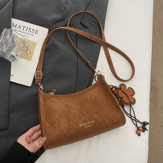 Damen Umhängetasche aus hochwertigem Kunstleder mit elegantem Reißverschluss Nord Taschen