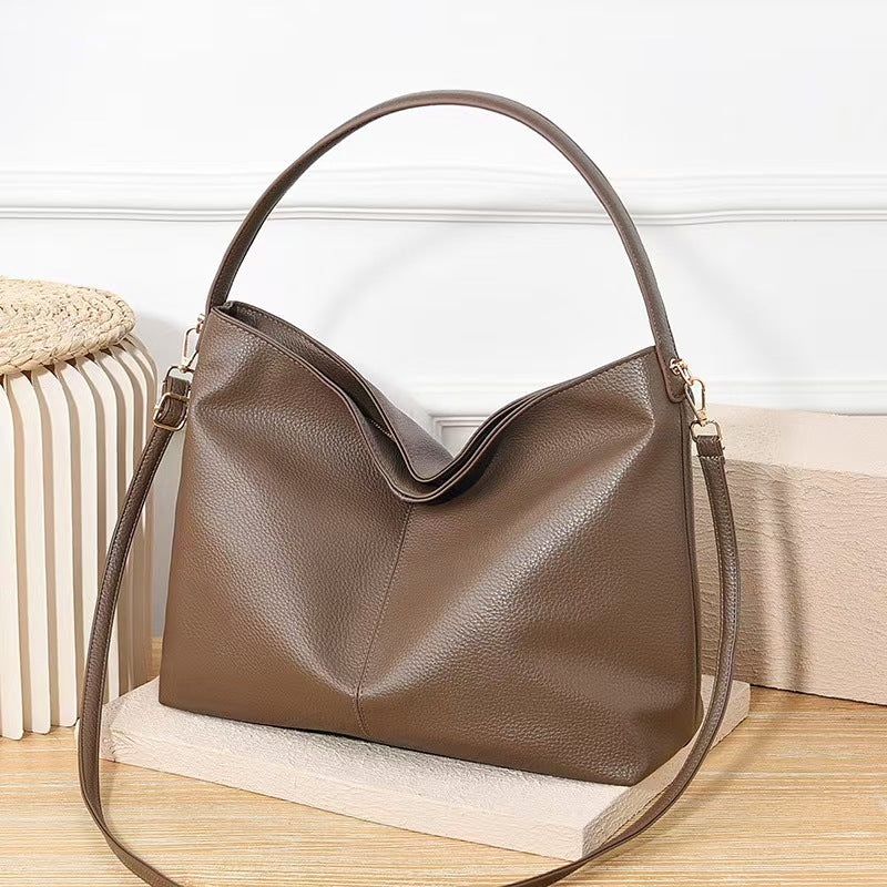 Damen praktische Umhängetasche mit geschwungenem Design Nord Taschen