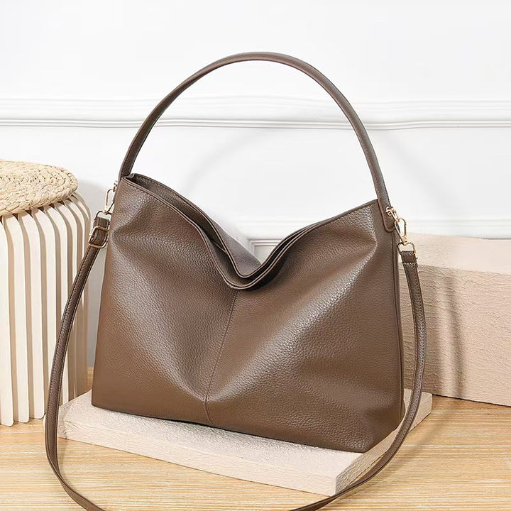 Damen praktische Umhängetasche mit geschwungenem Design Nord Taschen