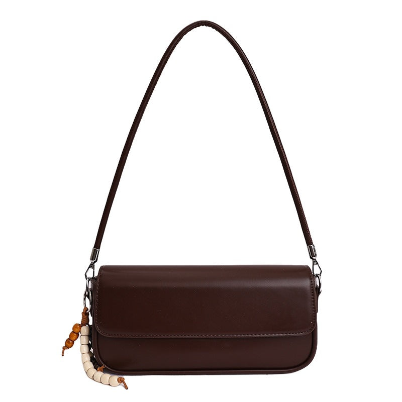 Damen elegante Handtasche mit dekorativem Anhänger Nord Taschen
