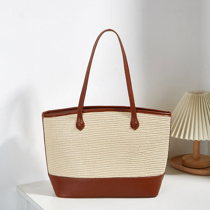 Damen Einkaufstasche aus strapazierfähigem, geflochtenem Material mit eleganten Lederakzenten Nord Taschen