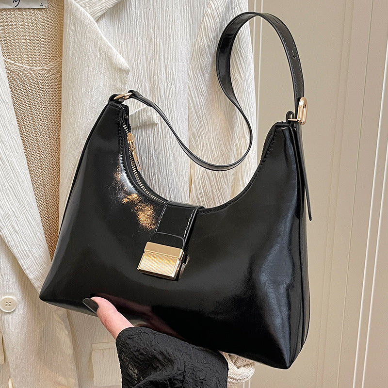 Damen elegante Handtasche mit glänzendem Obermaterial und innovativem Verschluss Nord Taschen