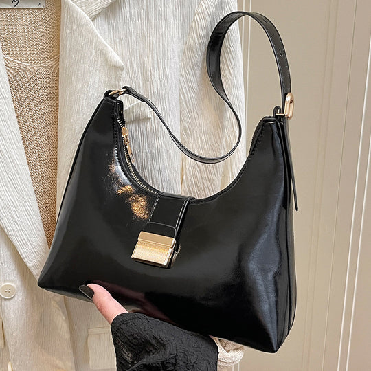 Damen elegante Handtasche mit glänzendem Obermaterial und innovativem Verschluss Nord Taschen