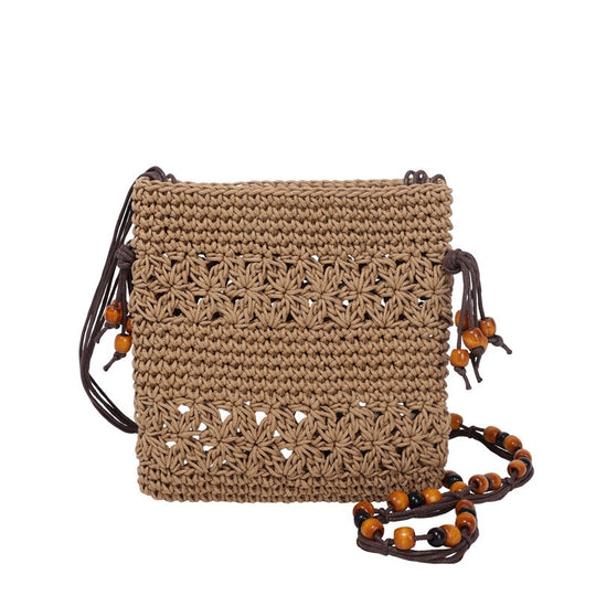 Damenhandtasche aus handgewebtem Naturmaterial mit verspielten Details Nord Taschen