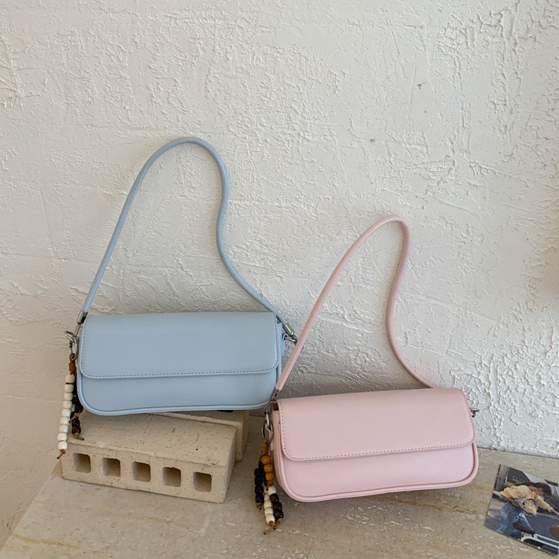 Damen elegante Handtasche mit dekorativem Anhänger Nord Taschen