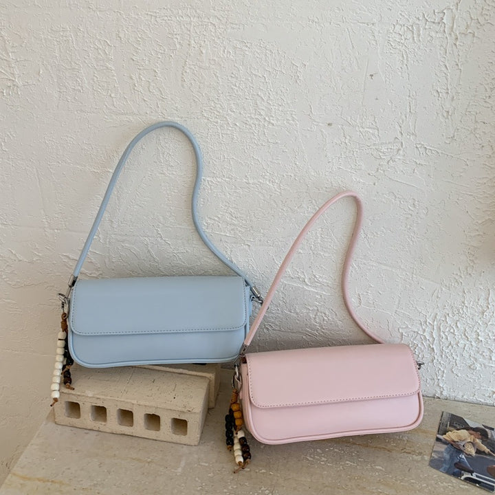 Damen elegante Handtasche mit dekorativem Anhänger Nord Taschen