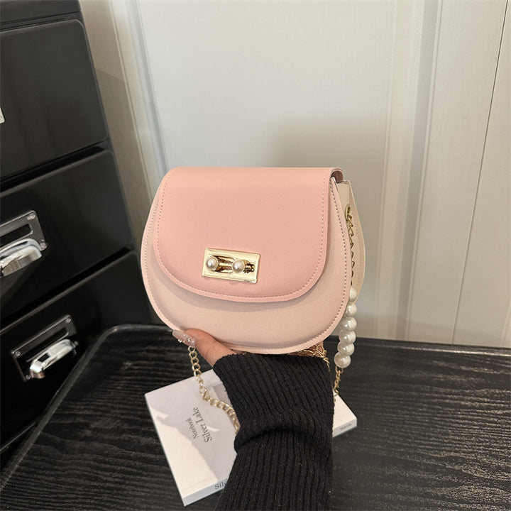 Damen Umhängetasche mit elegantem Klappverschluss und perlenverziertem Tragegriff Nord Taschen