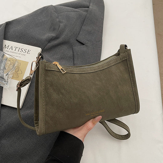 Damen Umhängetasche aus hochwertigem Kunstleder mit elegantem Reißverschluss Nord Taschen