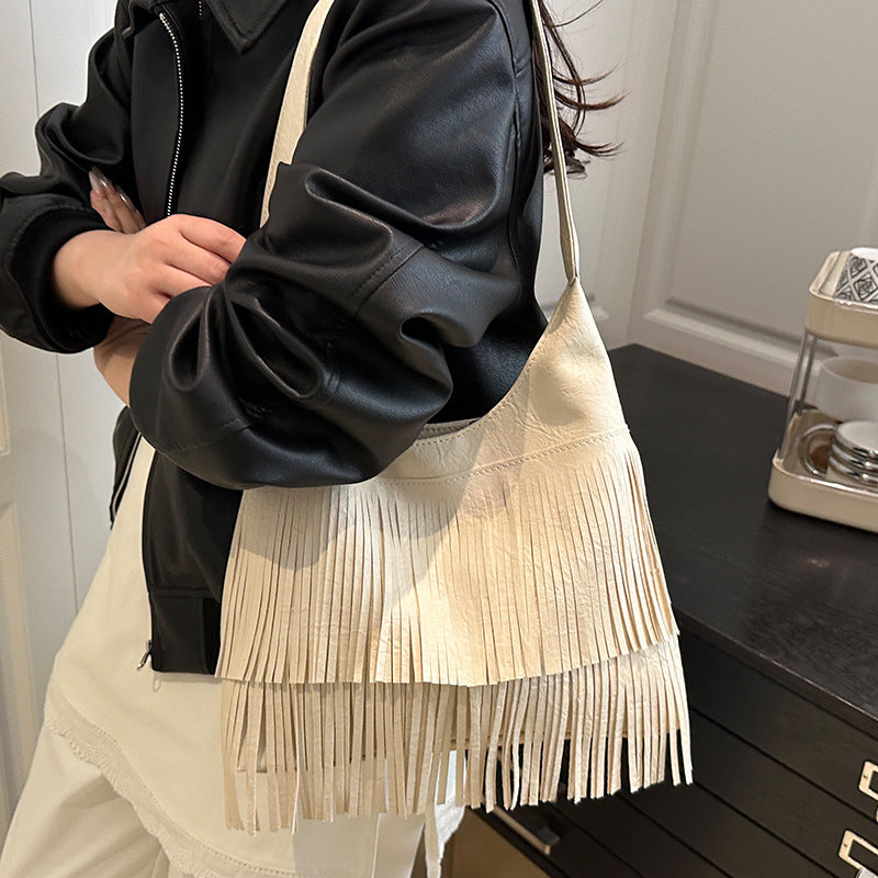 Damen Umhängetasche mit fransigem Design und robustem Tragegriff Nord Taschen