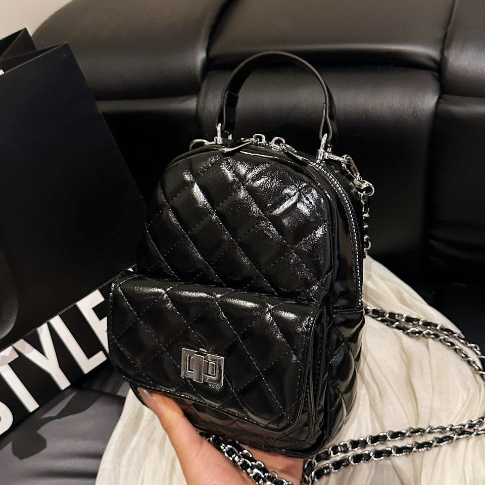 Damen modische Mini-Rucksacktasche mit elegantem Kettenriemen Nord Taschen