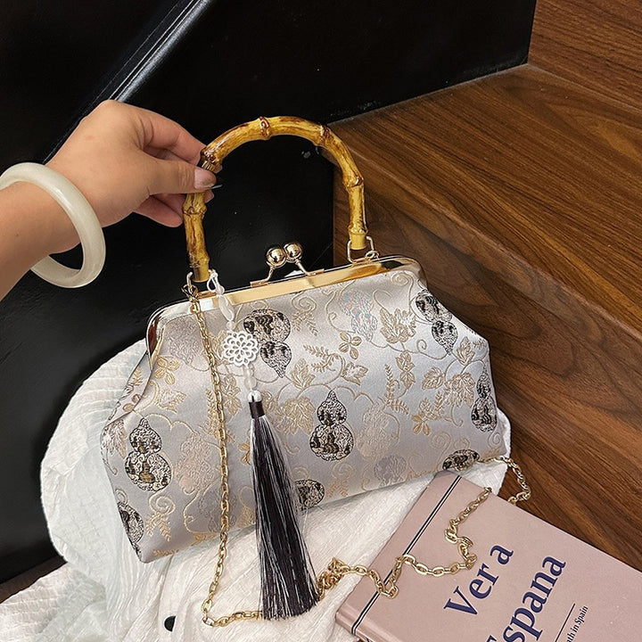 Damen elegante Handtasche mit Bambusgriffen und floralem Design Nord Taschen