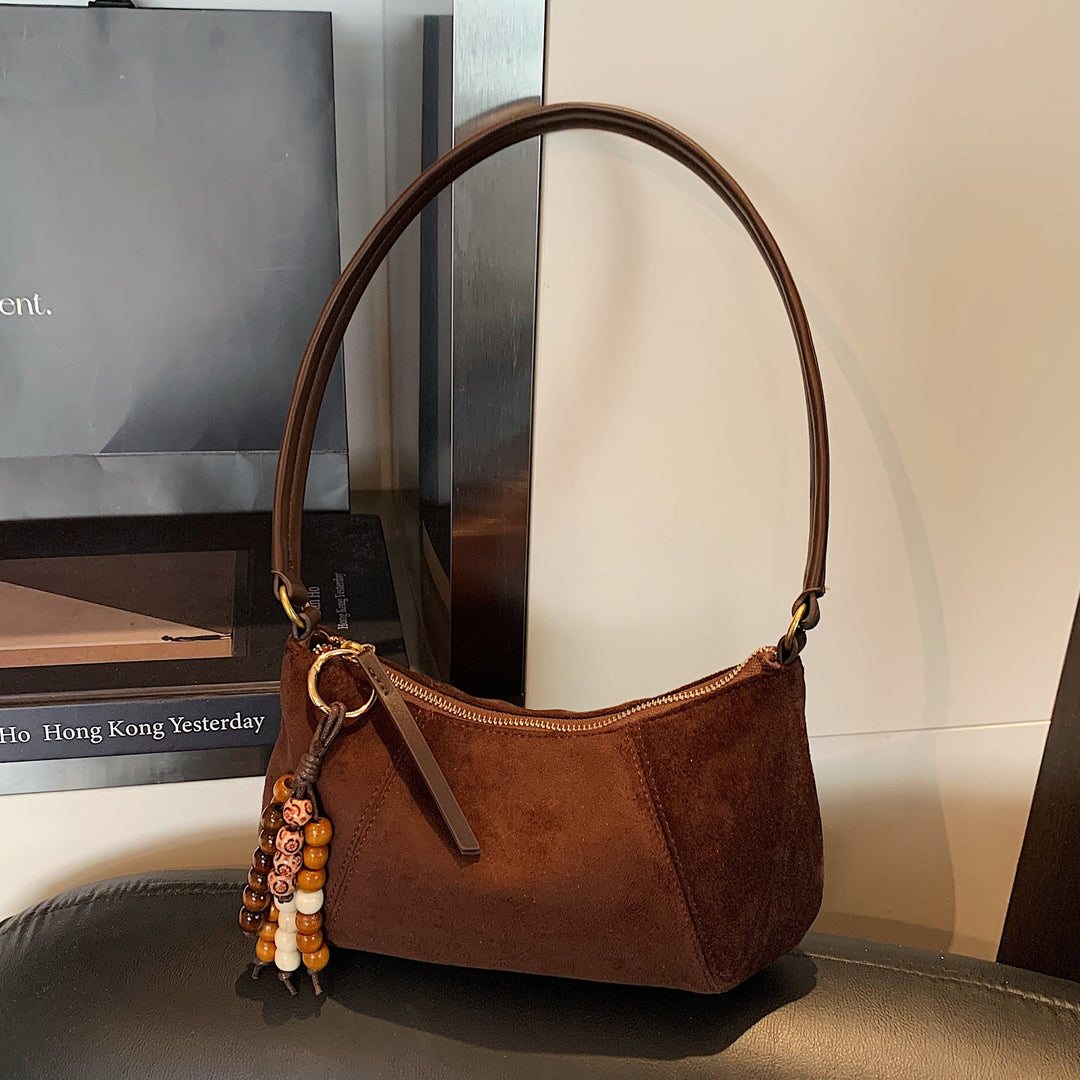 Damen Schultertasche aus weichem Veloursleder mit eleganter Form Nord Taschen